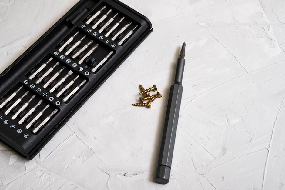 Professional window installation tools and materials laid out for a project